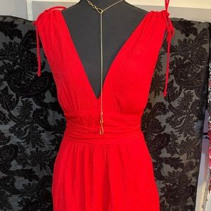 Red woman’s romper size medium NWT’s.